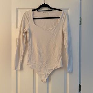 Abercrombie & Fitch Soft AF Seamless Long-Sleeve Bodysuit Ivory Color